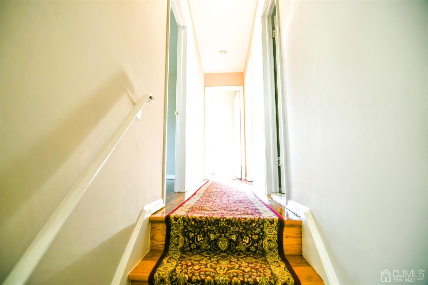 107 Calvert Avenue East Edison, NJ 08820 - Photo 15 of 28 a bedroom with a bed and a window