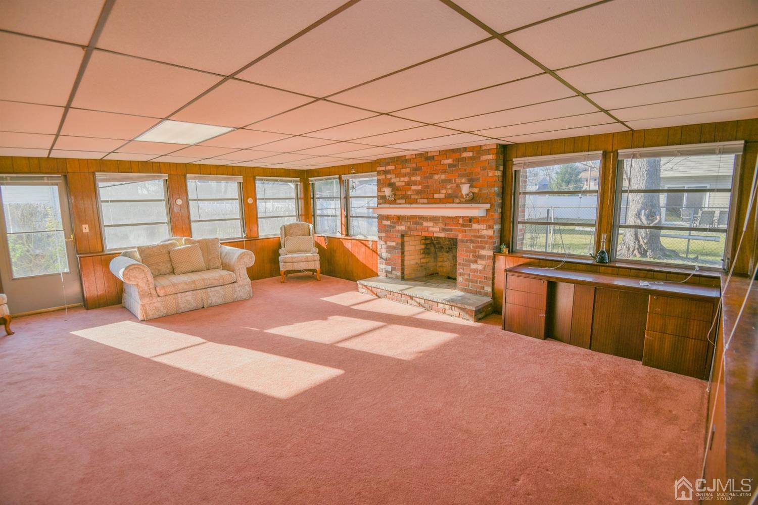 107 Calvert Avenue East Edison, NJ 08820 - Photo 20 of 28 a spacious bedroom with a large bed and a large window
