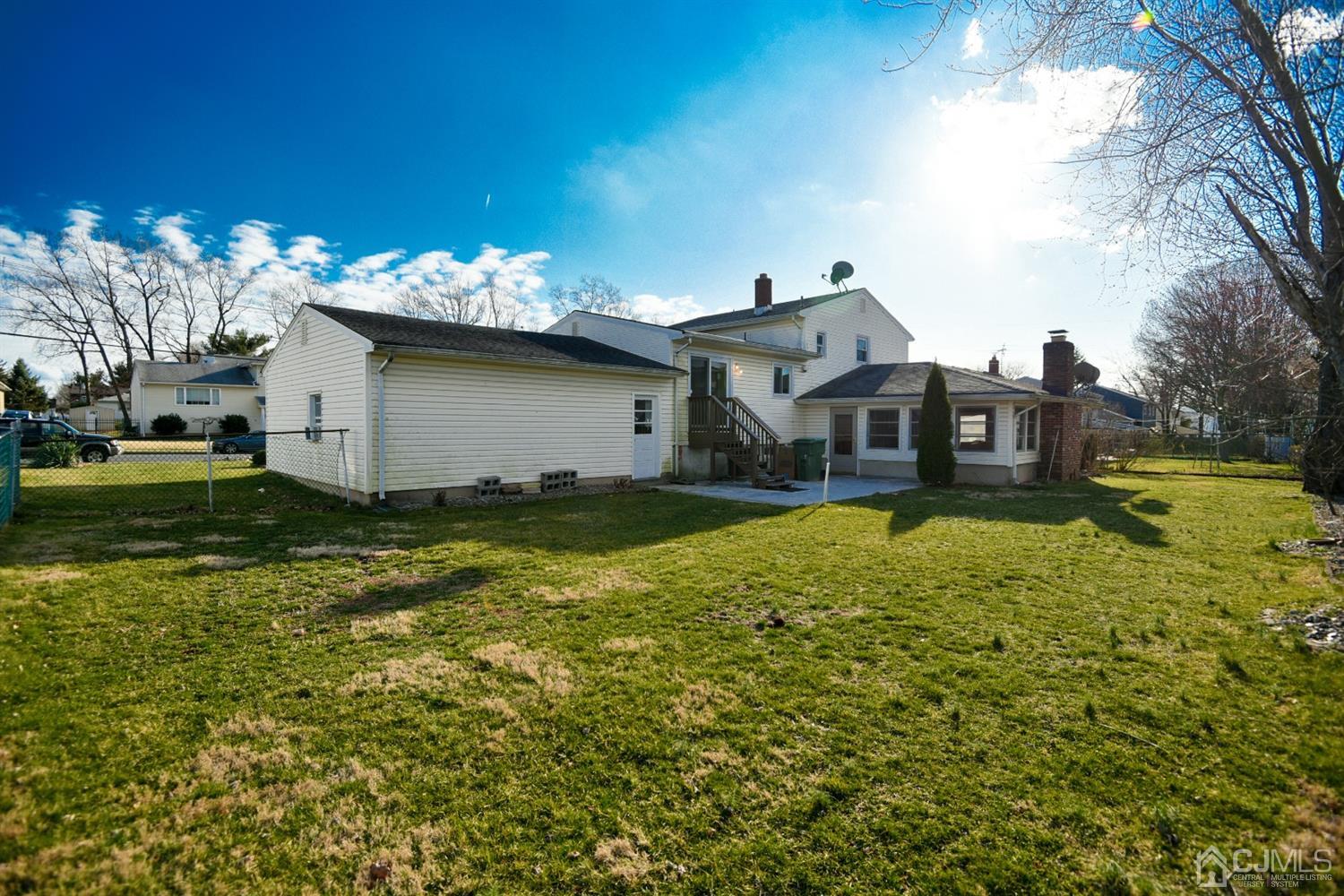 107 Calvert Avenue East Edison, NJ 08820 - Photo 26 of 28 a house view with a swimming pool