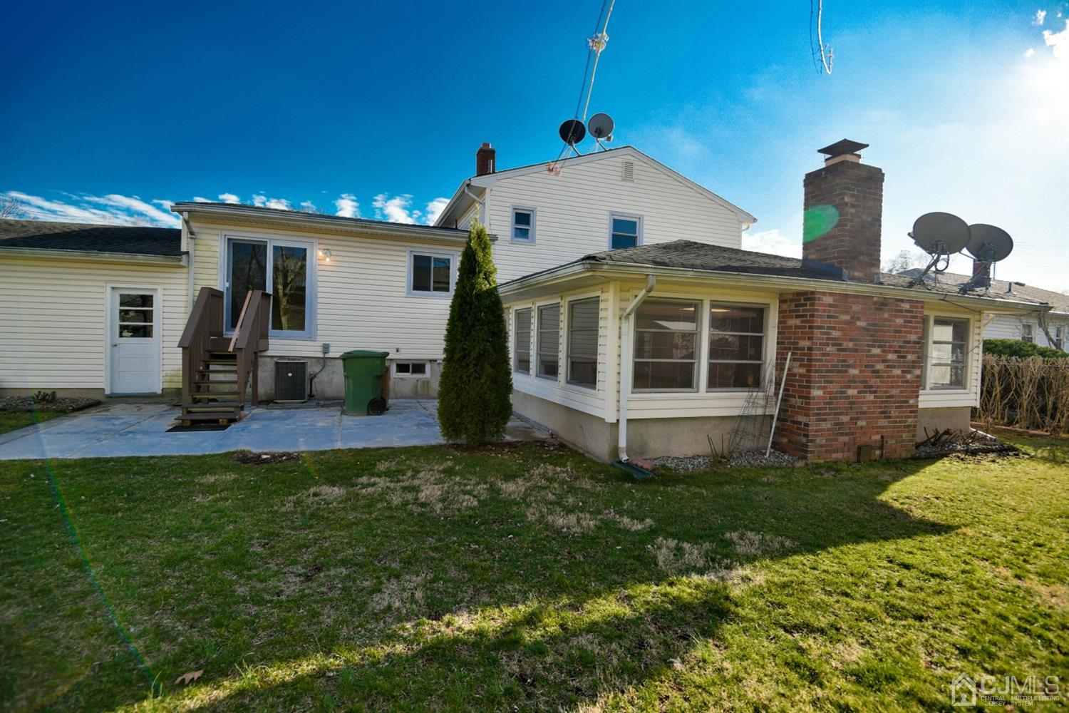 107 Calvert Avenue East Edison, NJ 08820 - Photo 27 of 28 a view of a house with backyard