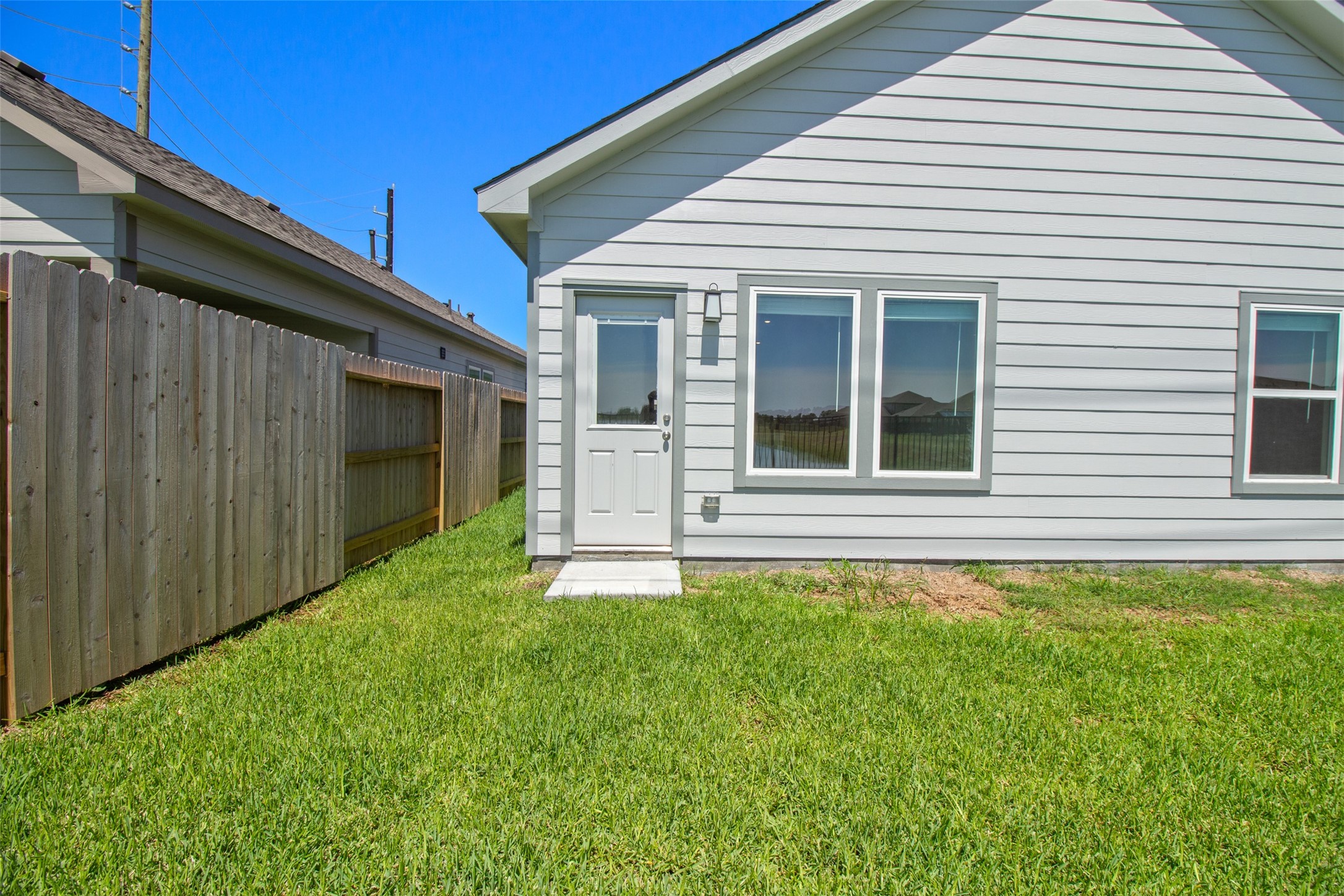 6643 Escondido Drive Rosharon, TX 77583 - Photo 22 of 25 a view of a house with a yard