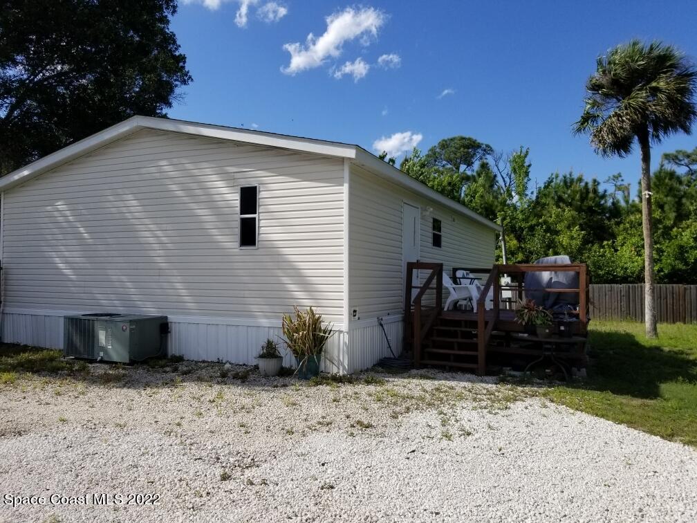 4051 Fountain Palm Road Cocoa, FL 32926 - Photo 19 of 25 a view of a backyard