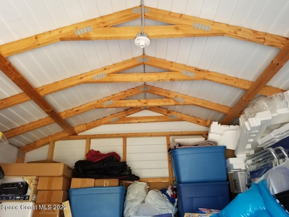 4051 Fountain Palm Road Cocoa, FL 32926 - Photo 21 of 25 a blue and white umbrella sitting in front of a blue umbrella