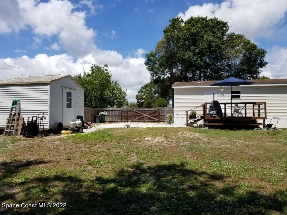4051 Fountain Palm Road Cocoa, FL 32926 - Photo 4 of 25 a view of a house with backyard