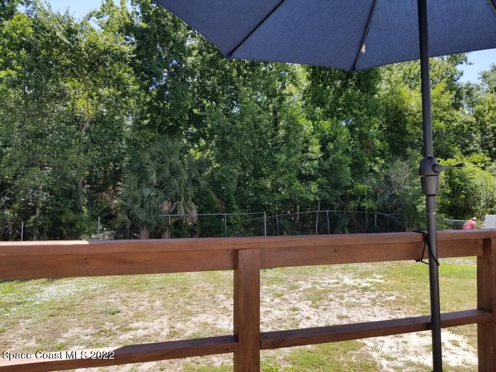 4051 Fountain Palm Road Cocoa, FL 32926 - Photo 7 of 25 a view of a backyard