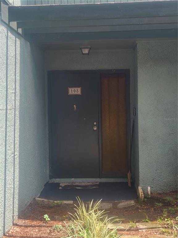 703 Southwest 75th Street, Unit 108 Gainesville, FL 32607 - Photo 1 of 1 a view of room with window
