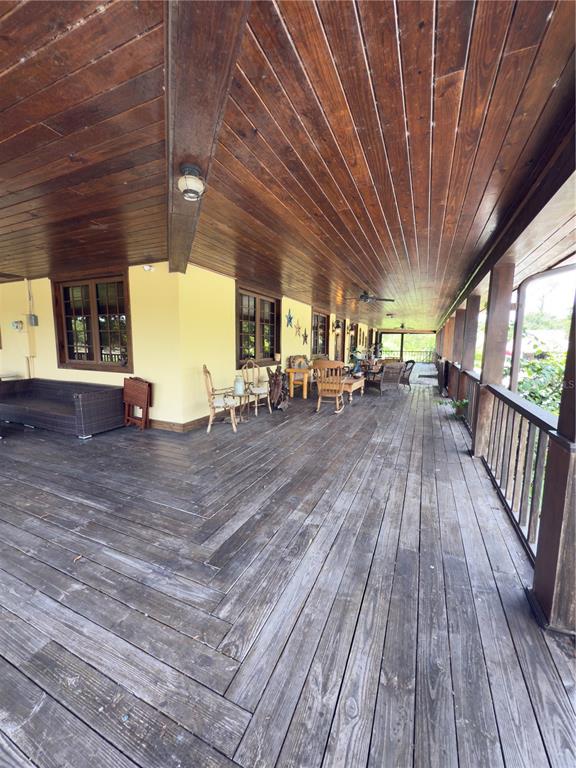 842 Hunting Club Avenue Clewiston, FL 33440 - Photo 22 of 34 a view of outdoor space with wooden floor