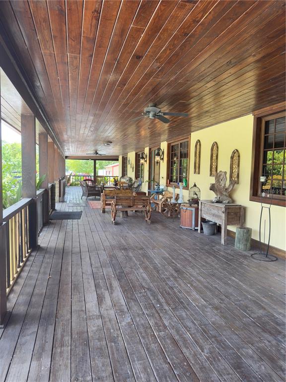 842 Hunting Club Avenue Clewiston, FL 33440 - Photo 24 of 34 a lobby with furniture and wooden floor