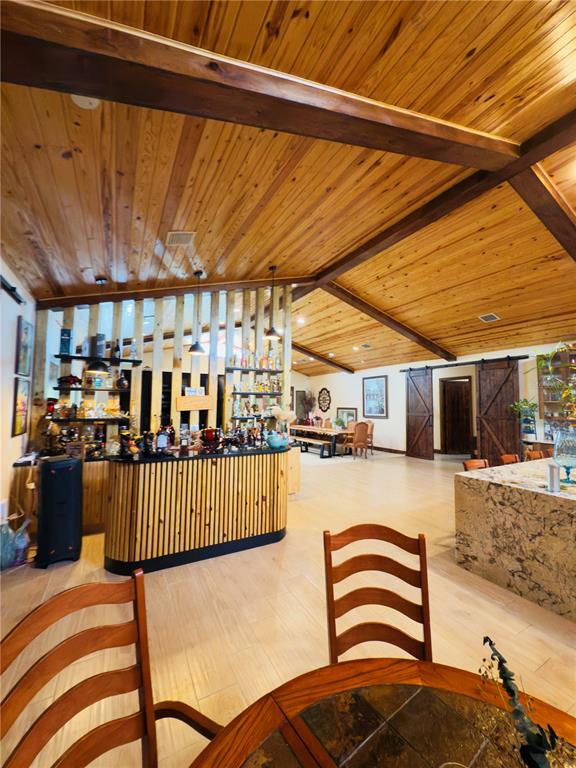 842 Hunting Club Avenue Clewiston, FL 33440 - Photo 9 of 34 a bedroom with furniture and wooden floor