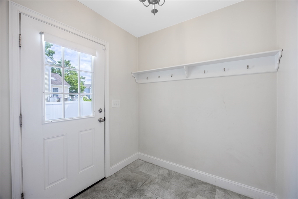 48 Spruce Street, Unit 1 Winchester, MA 01890 - Photo 6 of 29 a view of an empty room