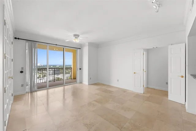 a view of an empty room with a window