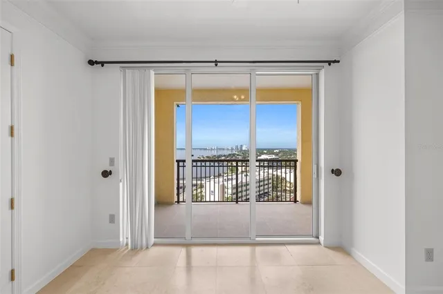 an empty room with a empty space and a window