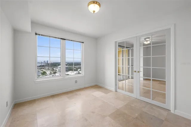 a kitchen with a stove and a refrigerator