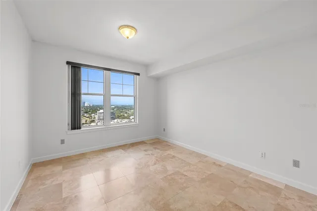 a bathroom with a shower and a toilet