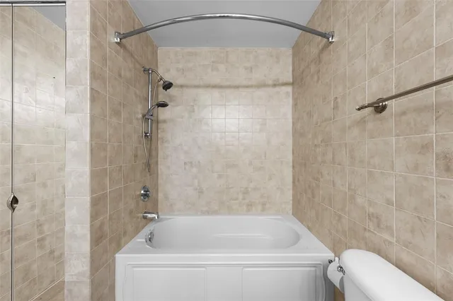 a view of a workspace with furniture and wooden floor