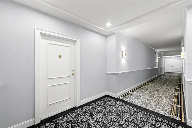 a view of a swimming pool with a lounge chair