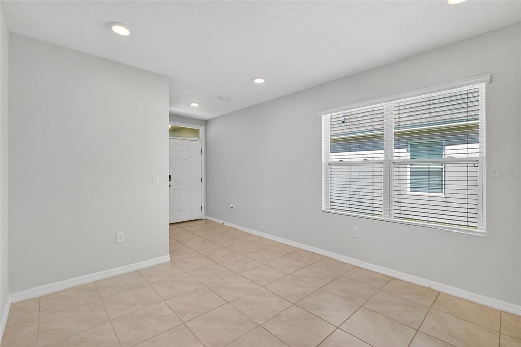 349 Honey Bell Road Winter Haven, FL 33880 - Photo 11 of 29 a view of an empty room with a window