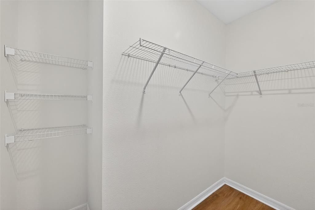 349 Honey Bell Road Winter Haven, FL 33880 - Photo 26 of 29 a view of a room with racks on the wall
