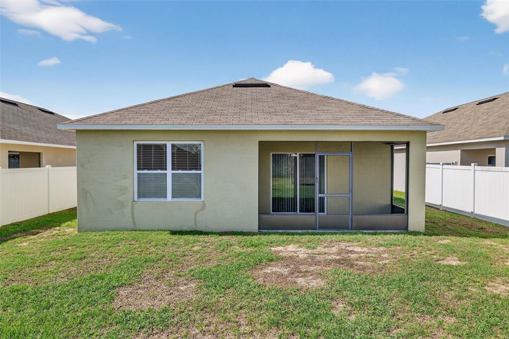 349 Honey Bell Road Winter Haven, FL 33880 - Photo 27 of 29 a front view of house with yard