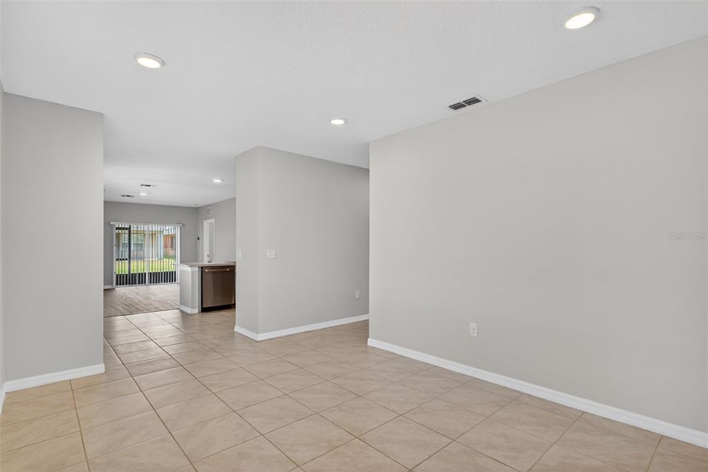 349 Honey Bell Road Winter Haven, FL 33880 - Photo 5 of 29 a view of an empty room with a window