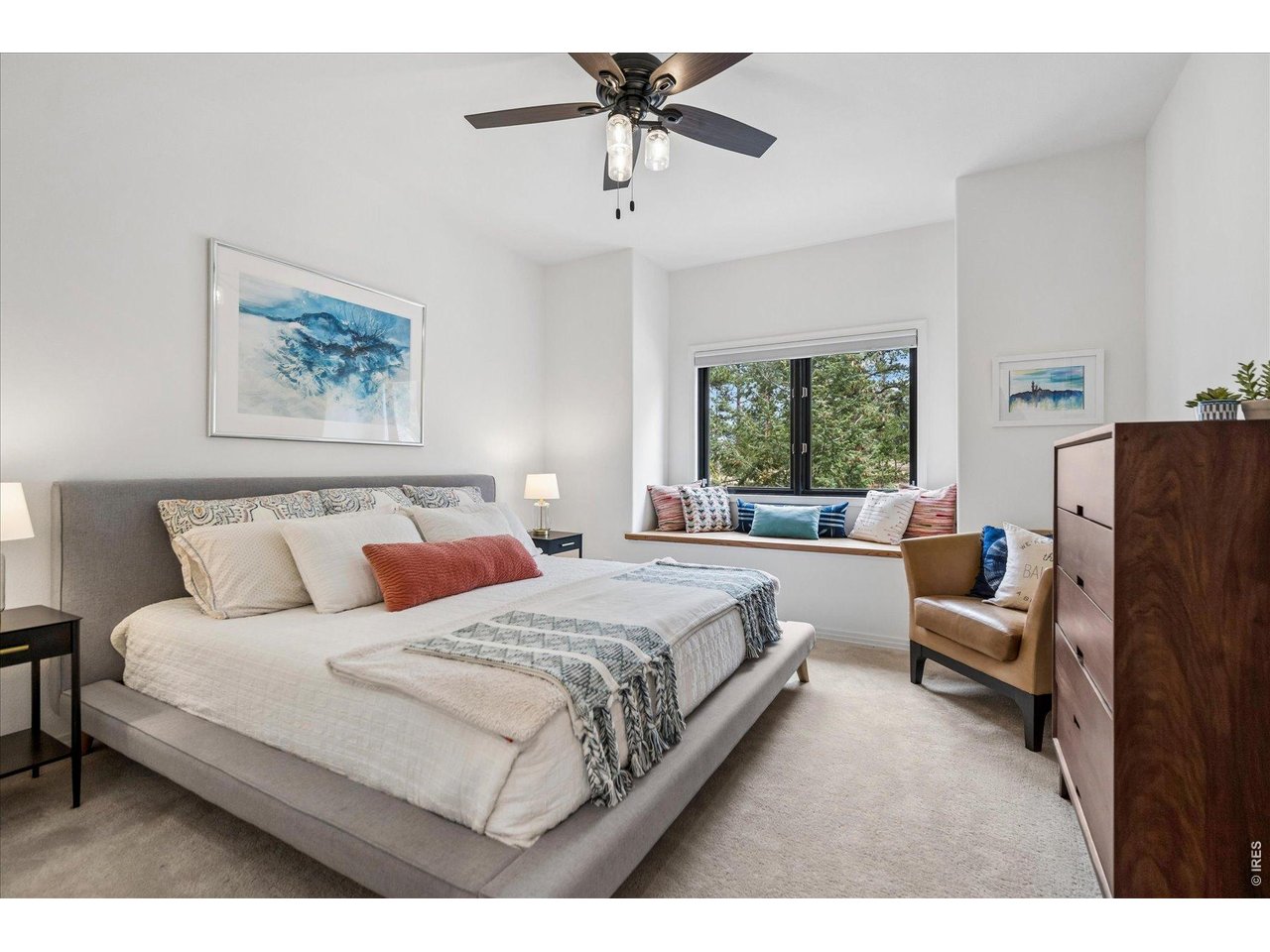 1424 Solitude Lane Evergreen, CO 80439 - Photo 25 of 46 a bedroom with bed and window