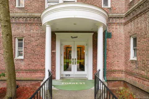 a front view of a house with a porch