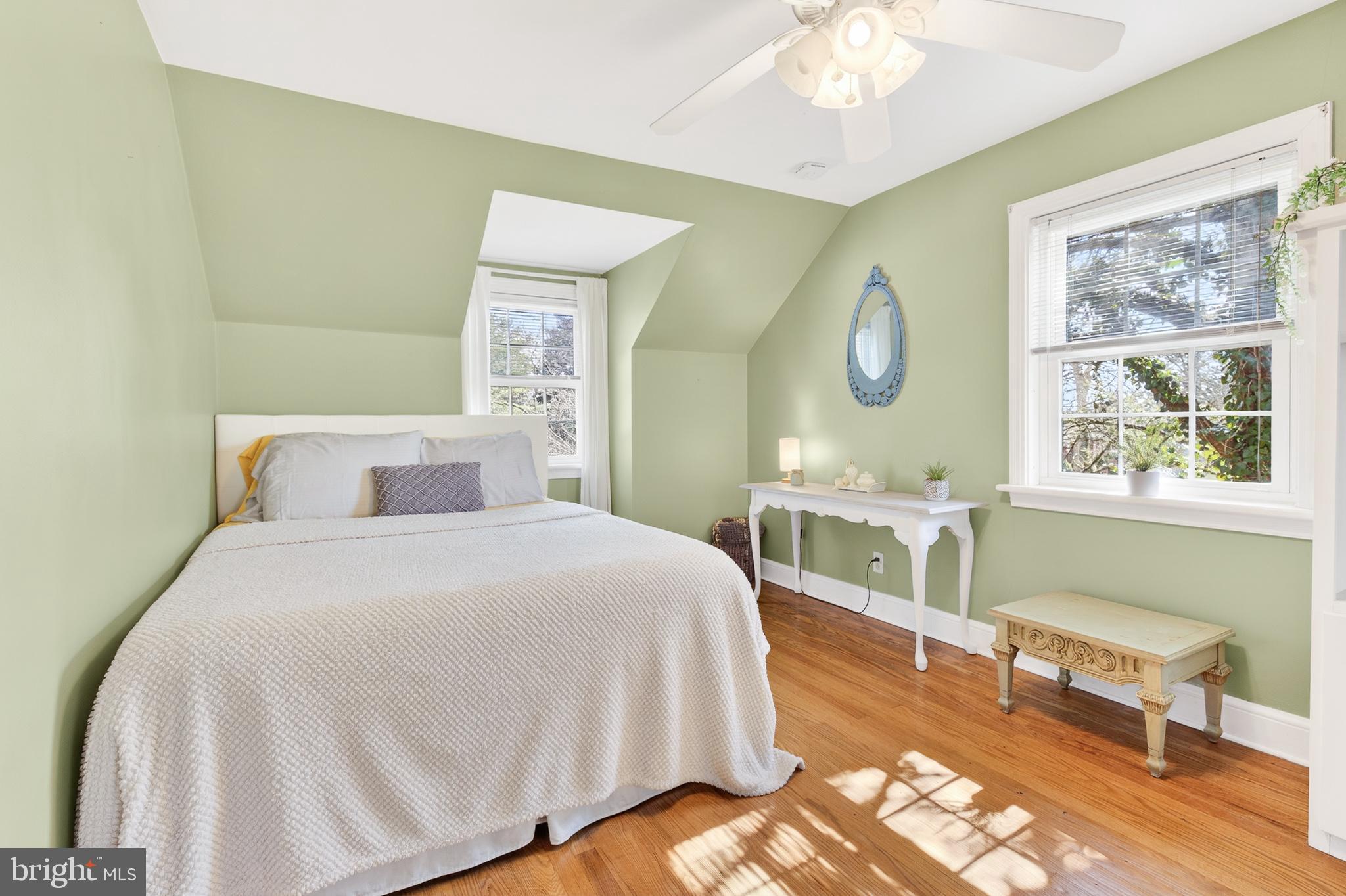 2315 Edgewood Road Harrisburg, PA 17104 - Photo 26 of 41 a spacious bedroom with a bed a chandelier and a window