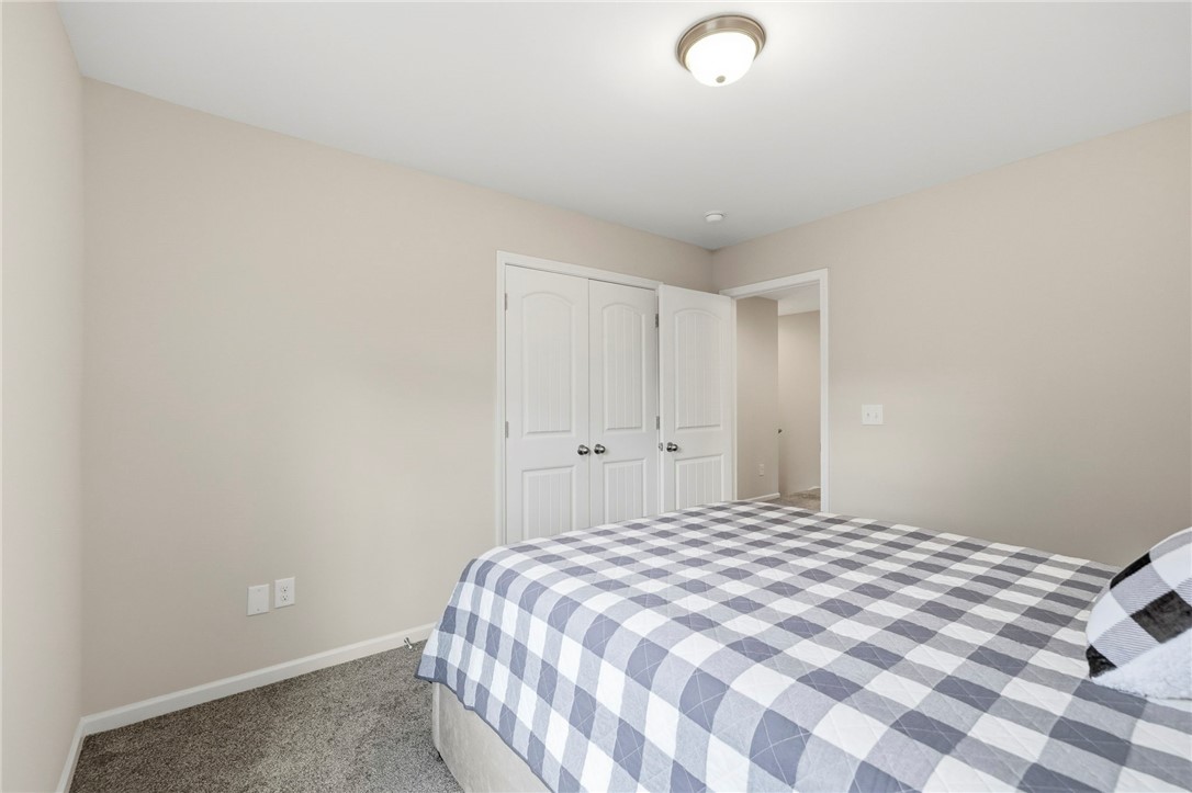 121 Wheaton Court Simpsonville, SC 29680 - Photo 28 of 40 This cozy room offers a comfortable retreat with plush carpeting and ample natural light.