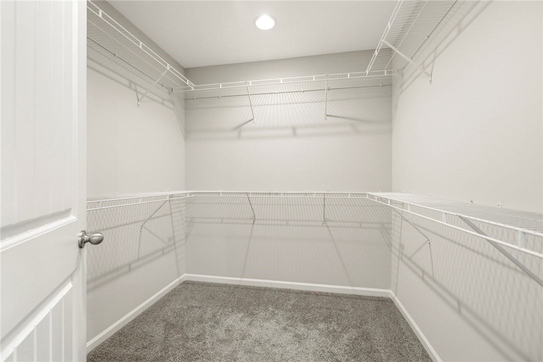 121 Wheaton Court Simpsonville, SC 29680 - Photo 36 of 40 This spacious closet offers ample storage and organization solutions.