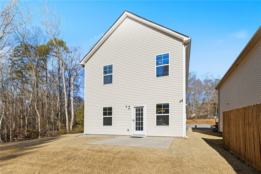 121 Wheaton Court Simpsonville, SC 29680 - Photo 38 of 40 This spacious property offers a private yard with a concrete patio, perfect for outdoor enjoyment.