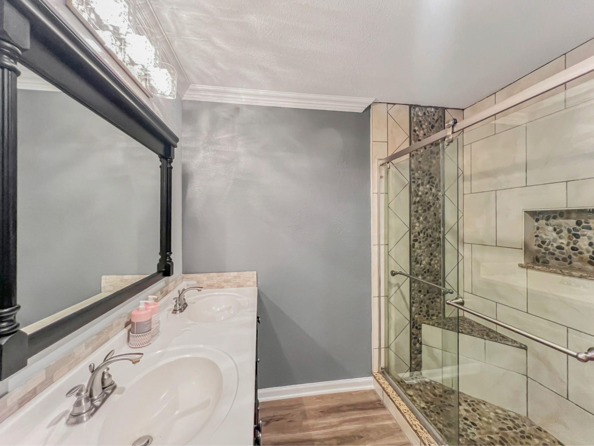 9731 Hadden Road Baytown, TX 77521 - Photo 35 of 47 a bathroom with a sink and shower