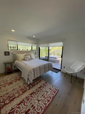 a lobby with furniture and a table