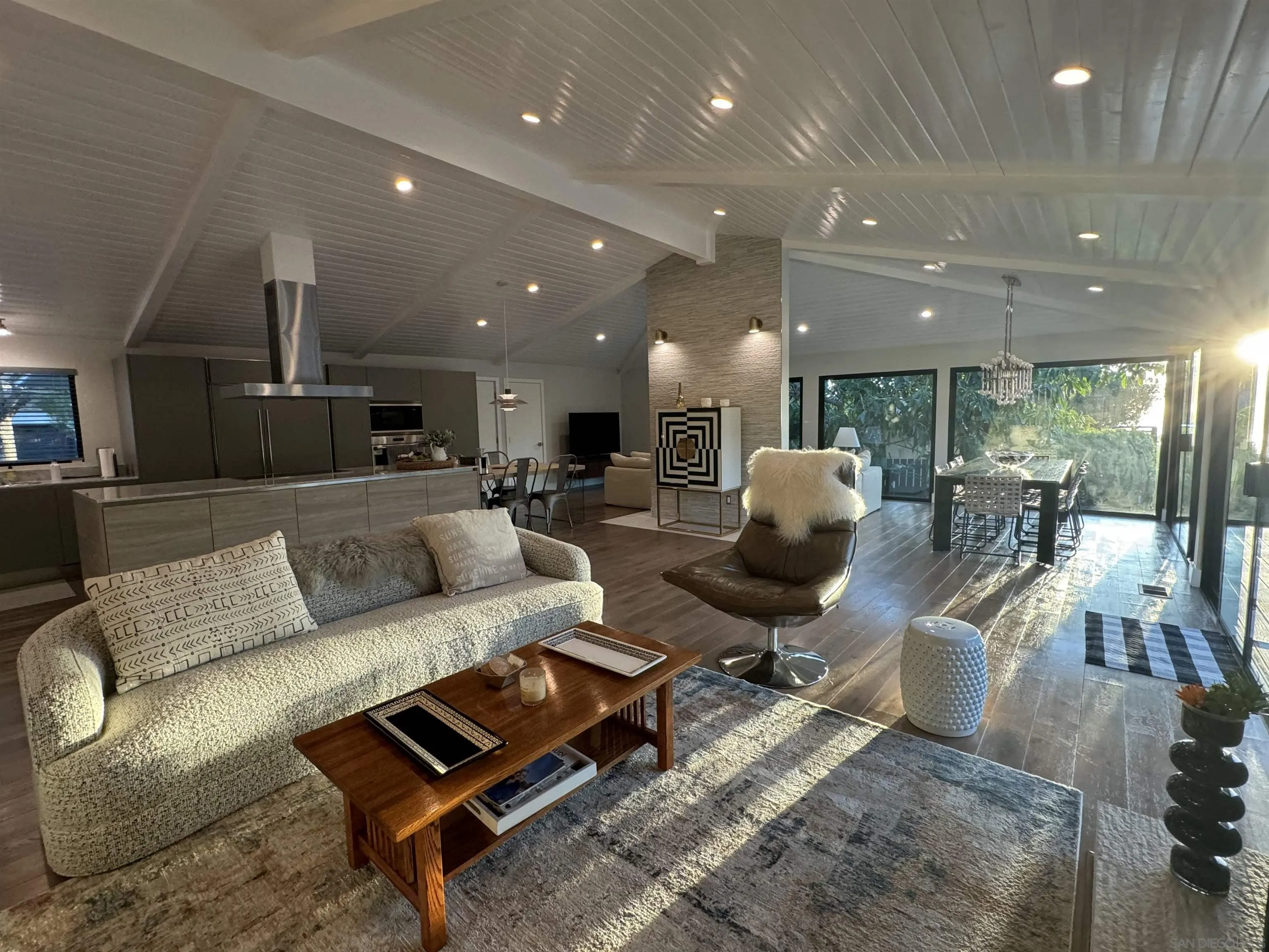 1402 Rodeo Drive La Jolla, CA 92037 - Photo 32 of 62 a living room with furniture and kitchen view