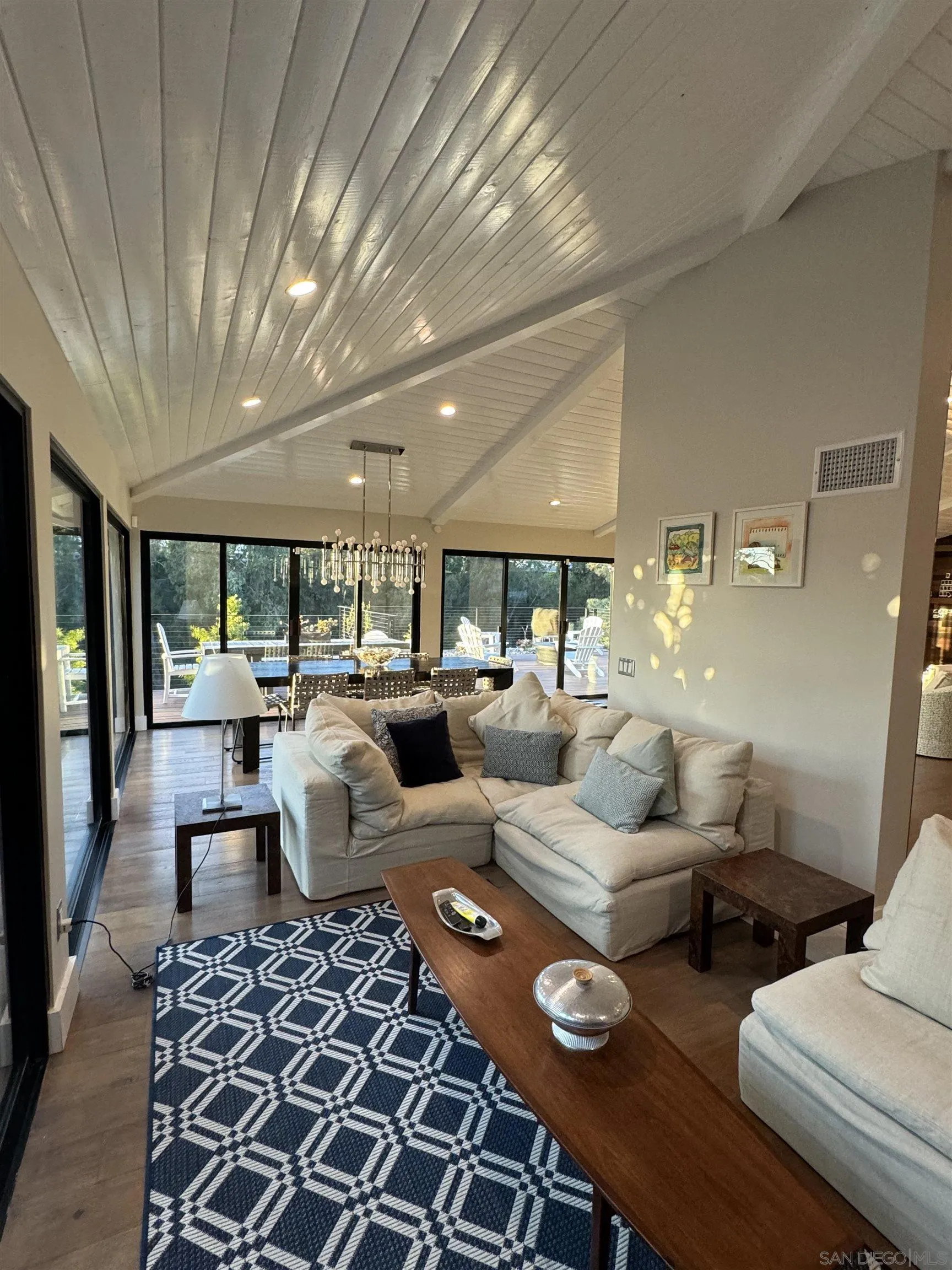 1402 Rodeo Drive La Jolla, CA 92037 - Photo 37 of 62 a living room with furniture and a large window