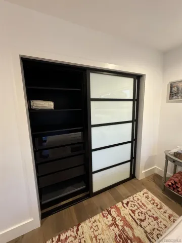 a workspace with furniture and window