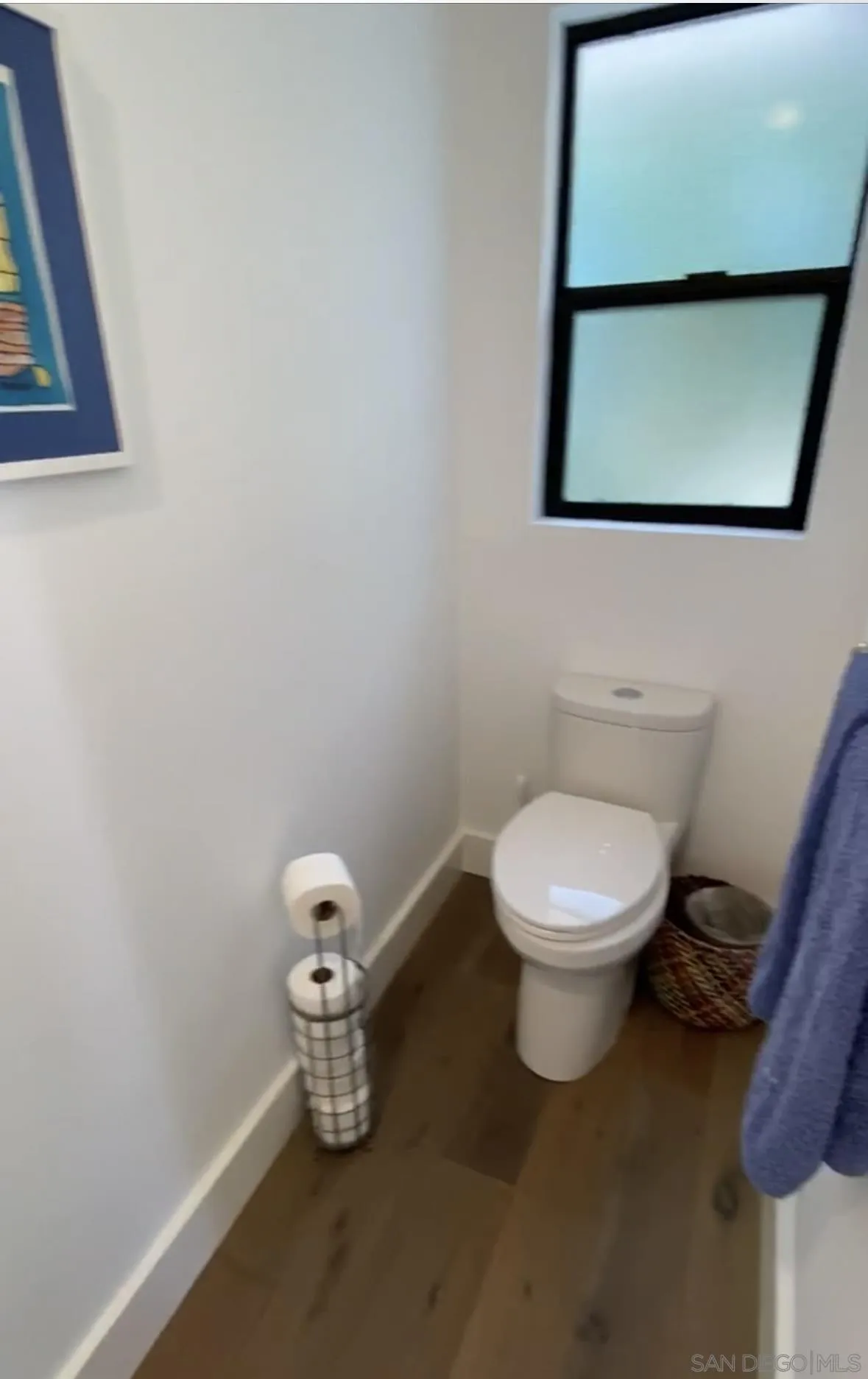 1402 Rodeo Drive La Jolla, CA 92037 - Photo 52 of 62 a white toilet sitting next to a shower