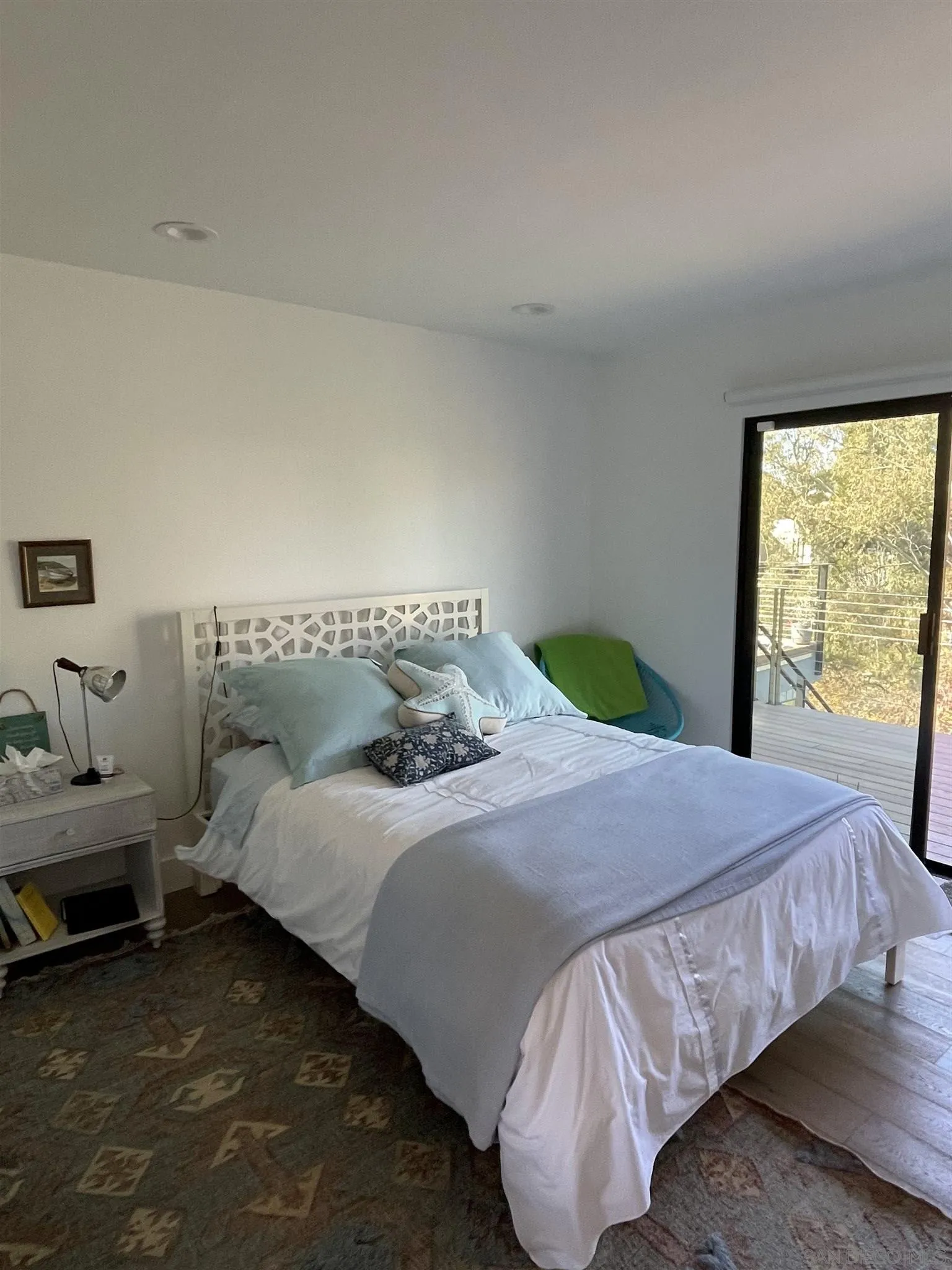 1402 Rodeo Drive La Jolla, CA 92037 - Photo 10 of 62 a bedroom with a bed and a window