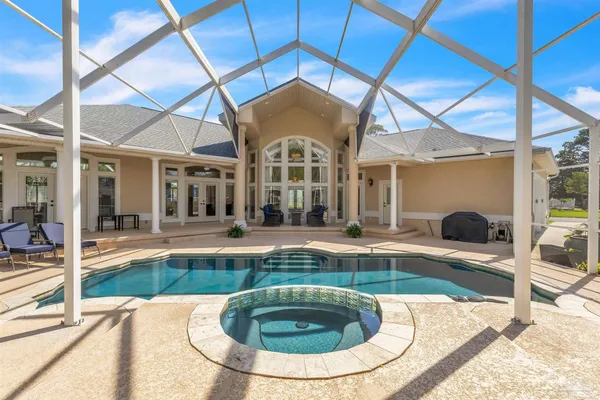 a view of a house with swimming pool