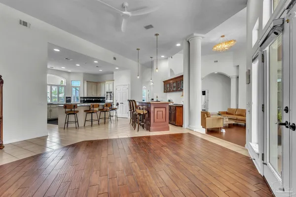 a living room with furniture fireplace and a flat screen tv