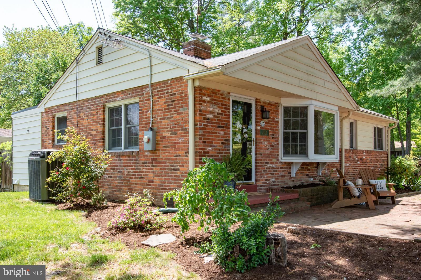 2101 Shenandoah Road Alexandria, VA 22308 - Photo 1 of 44 a front view of a house with garden