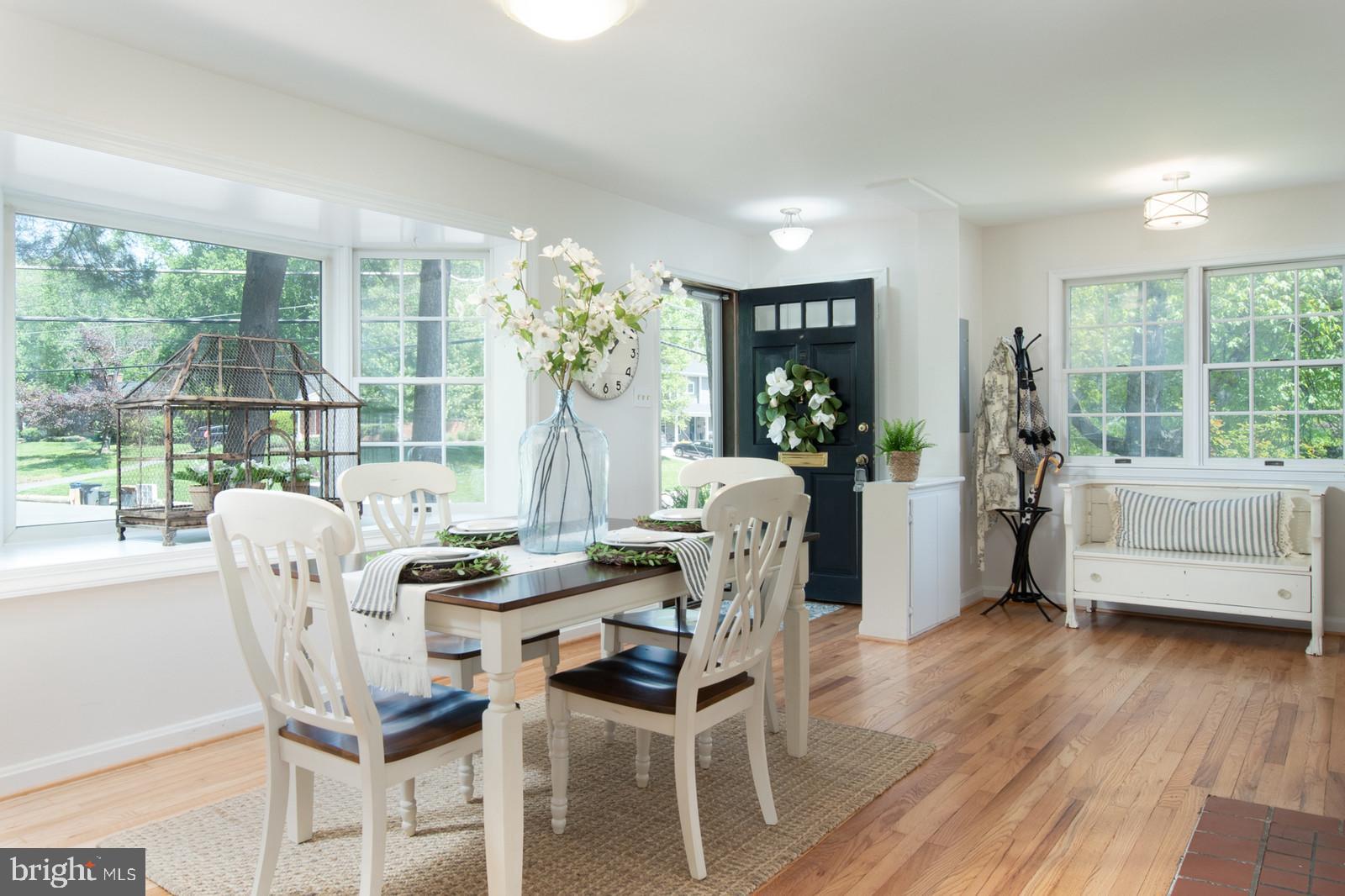 2101 Shenandoah Road Alexandria, VA 22308 - Photo 2 of 44 a dining room with furniture window and wooden floor