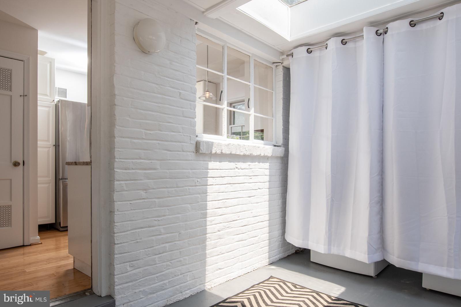 2101 Shenandoah Road Alexandria, VA 22308 - Photo 23 of 44 a view of a room with a door and a window