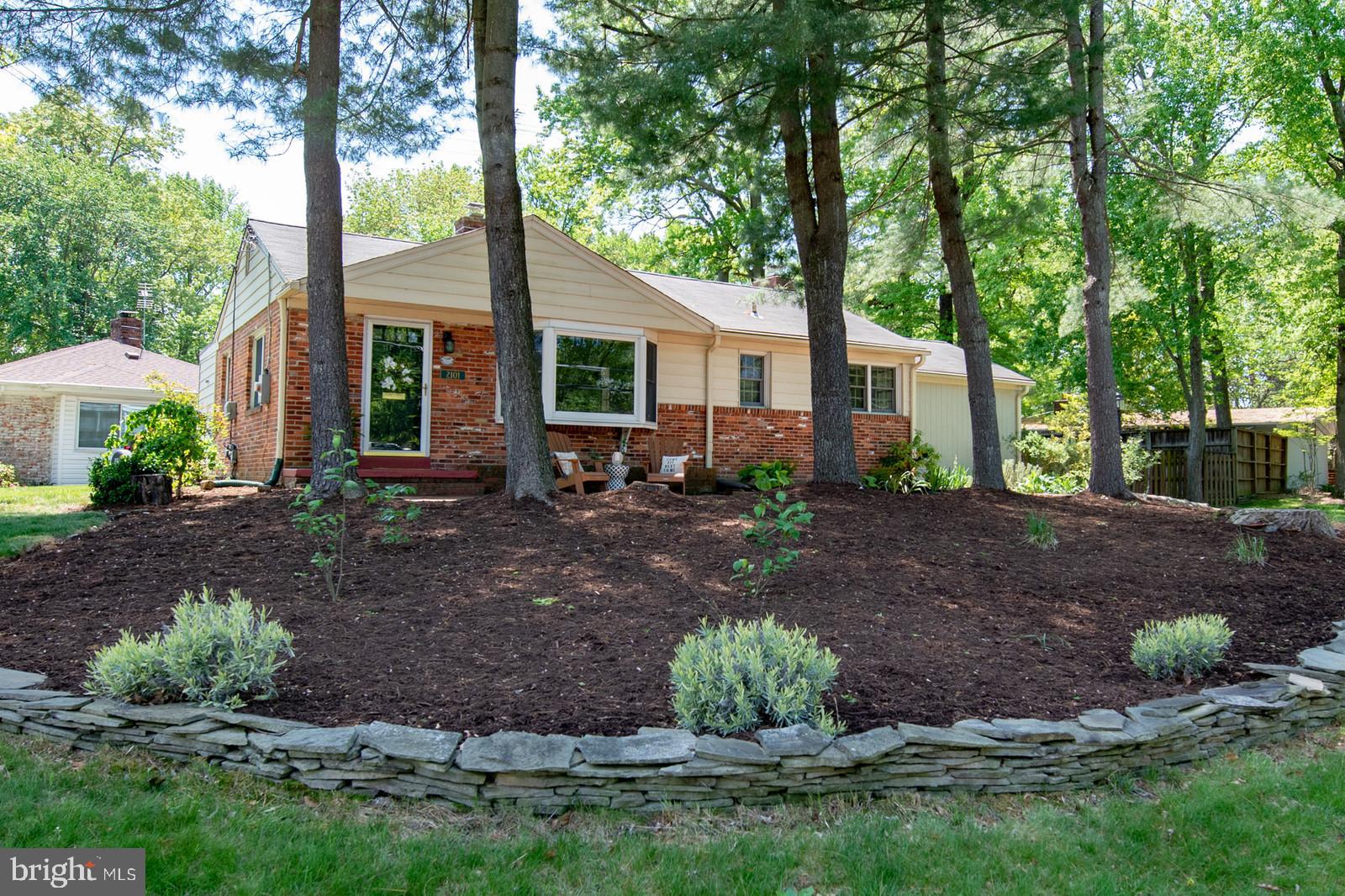 2101 Shenandoah Road Alexandria, VA 22308 - Photo 29 of 44 a front view of a house with garden