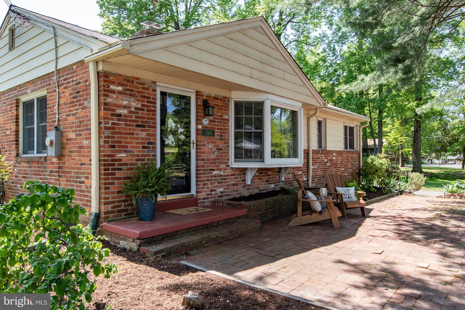 2101 Shenandoah Road Alexandria, VA 22308 - Photo 30 of 44 a view of a house with backyard and sitting area