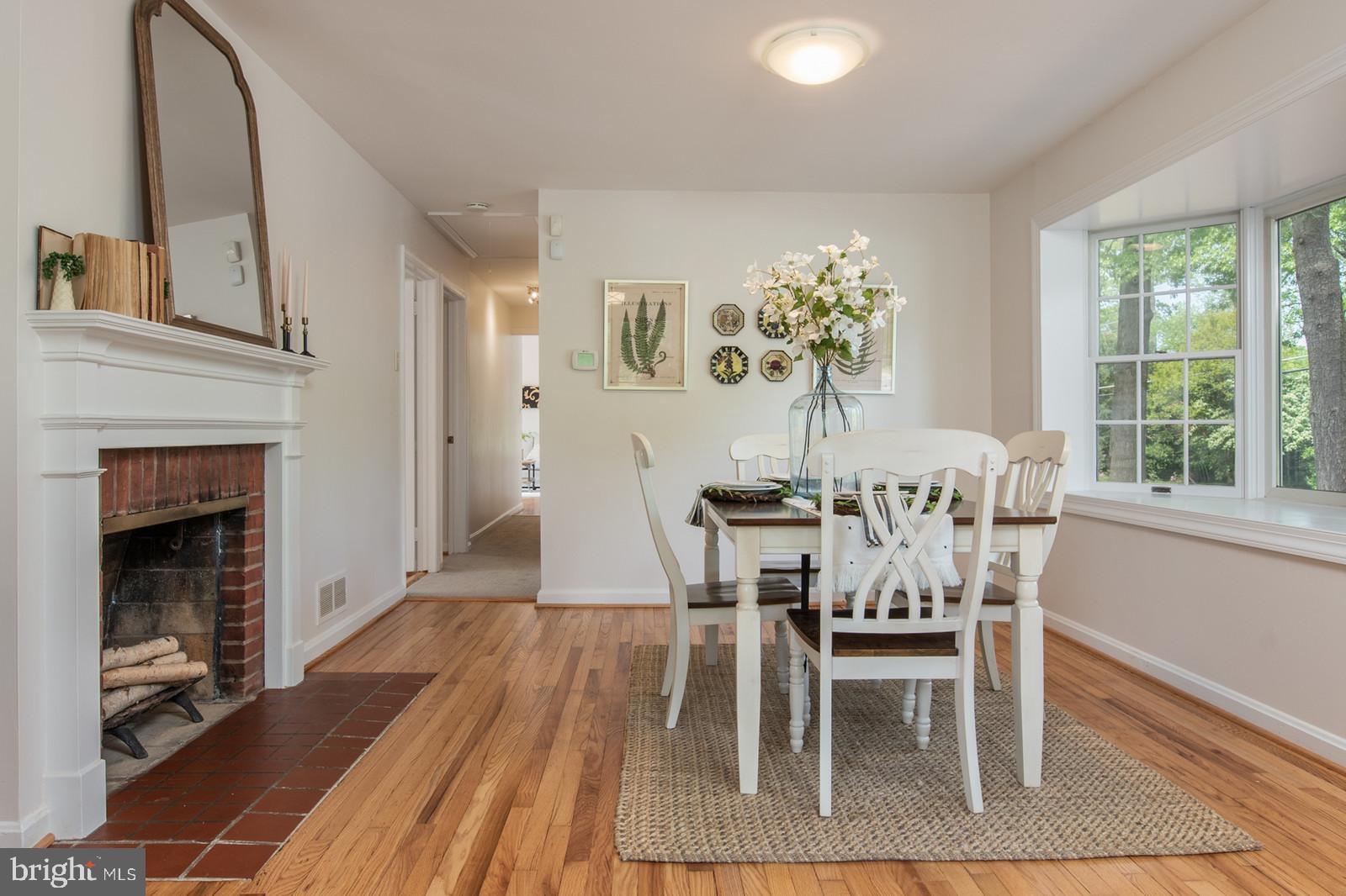 2101 Shenandoah Road Alexandria, VA 22308 - Photo 8 of 44 a view of a dining room with furniture window and wooden floor