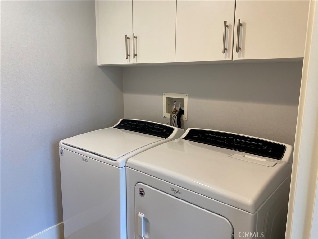 270 Rockefeller Irvine, CA 92612 - Photo 8 of 12 a utility room with dryer and washer