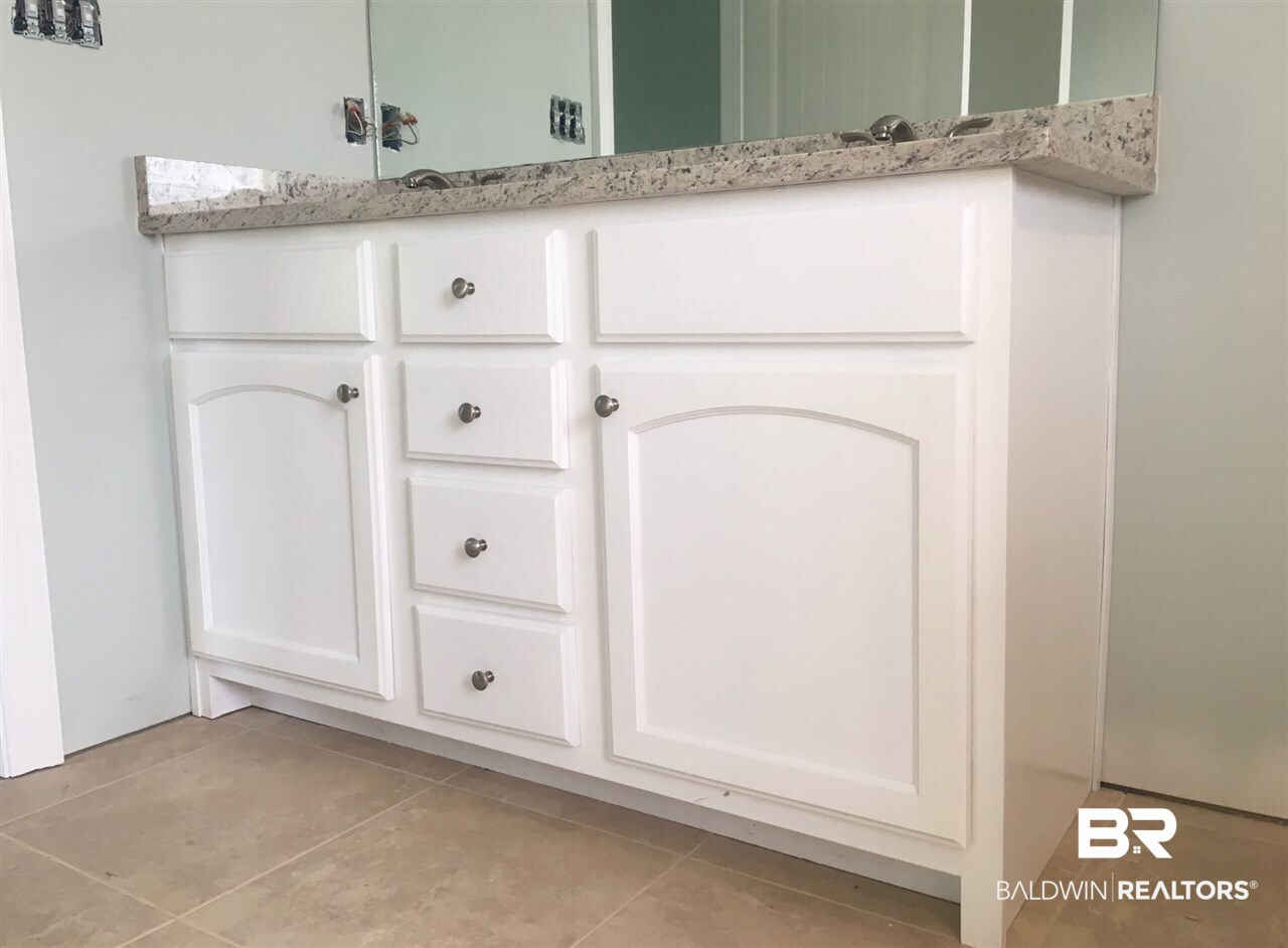 22567 Nana Loop West Silverhill, AL 36576 - Photo 3 of 4 Kitchen and Bathroom Cabinets - Painted White
