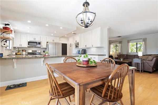 a view of a dining room with furniture