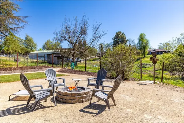 a view of a chairs and tables in the patio