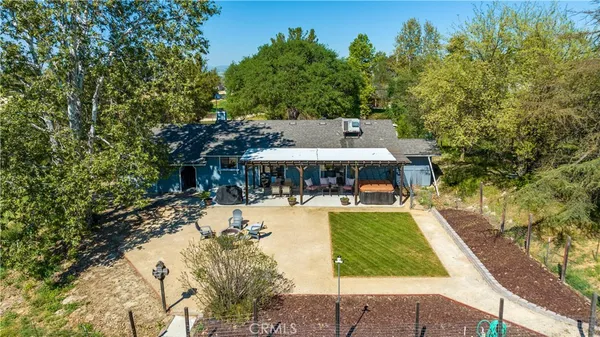 a view of a swimming pool with a patio